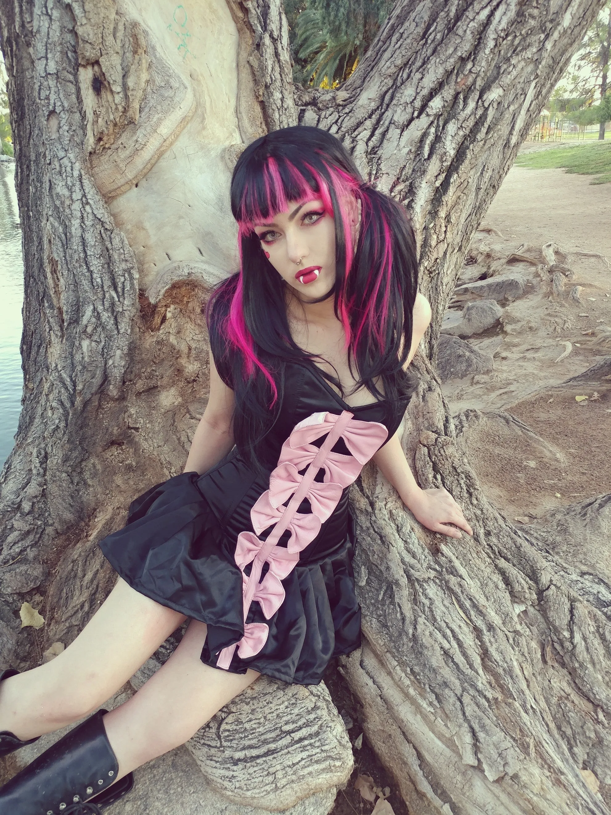Draculaura cosplay corset dress from black satin and leather bows. Halloween, gothic, vampire cosplay dress